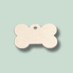 Hundetegn i form af et ben, på lysegrøn baggrund.