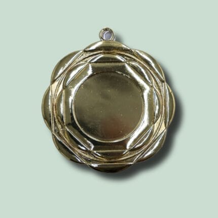 Gylden medalje på grøn baggrund