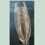 Champagneglas med indgraveret Gravity Studio logo