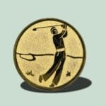 Golfspiller præget på guldfarvet medalje