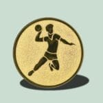 Guldmedalje med håndboldspiller silhuet