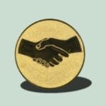 Gylden håndtryk ikon symboliserer samarbejde