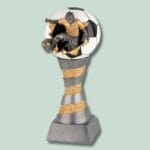 Fodboldtrofæ med spiller i aktion